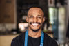 files/portrait-of-store-owner-in-his-store.avif
